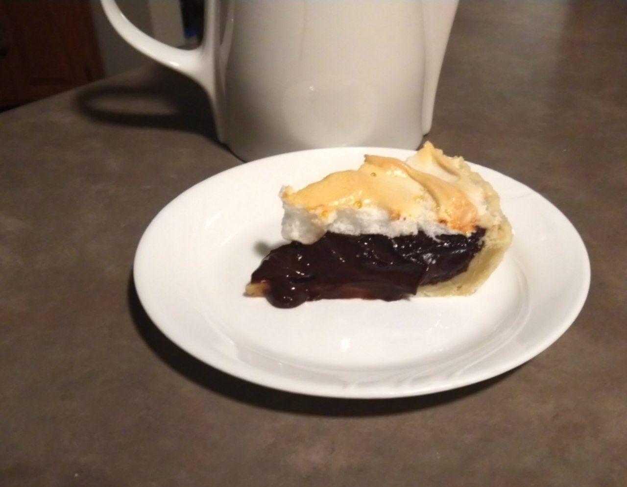 Slice of cocoa pie on a plate.