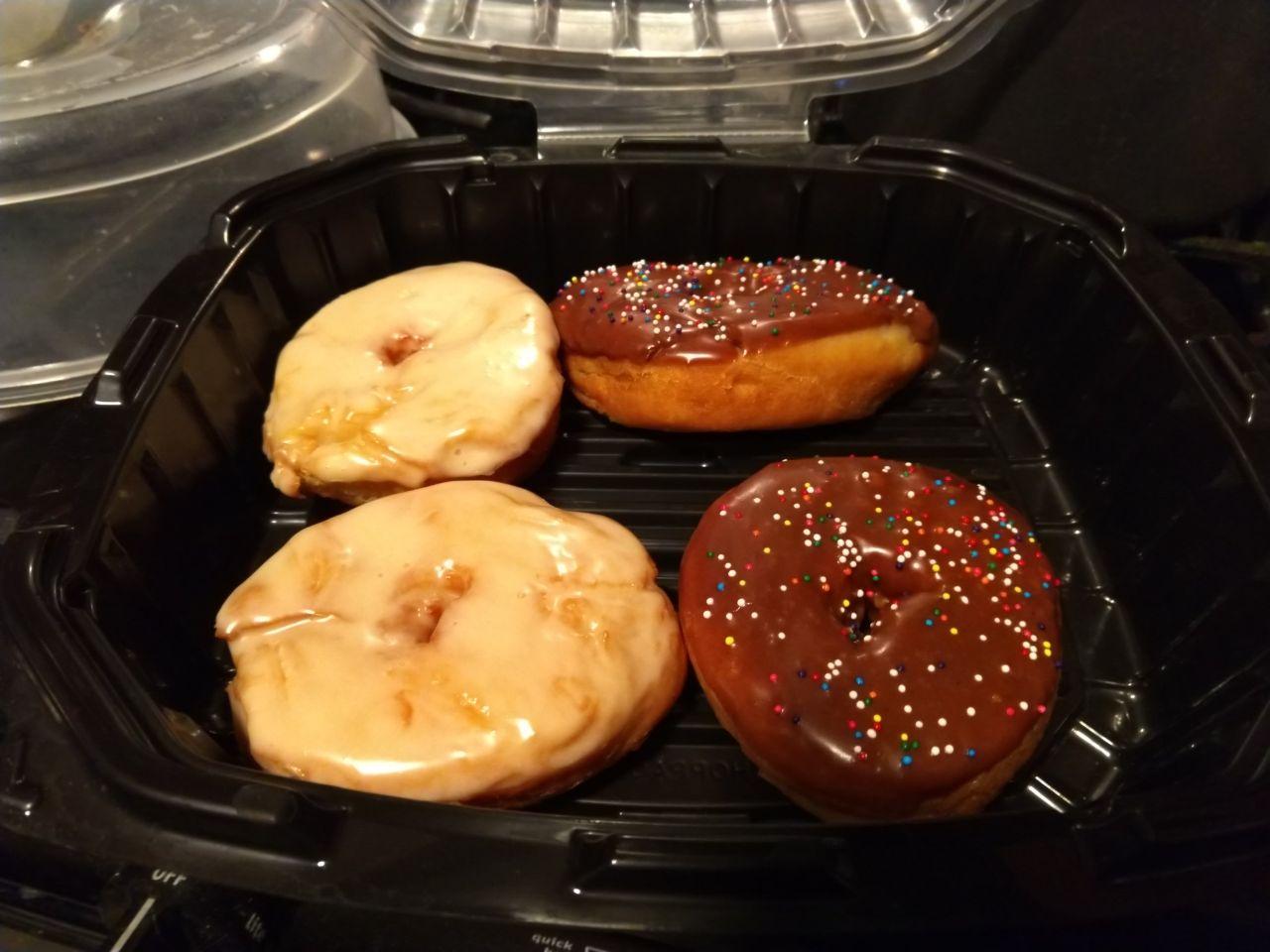 Homemade donuts with different kinds of glaze.