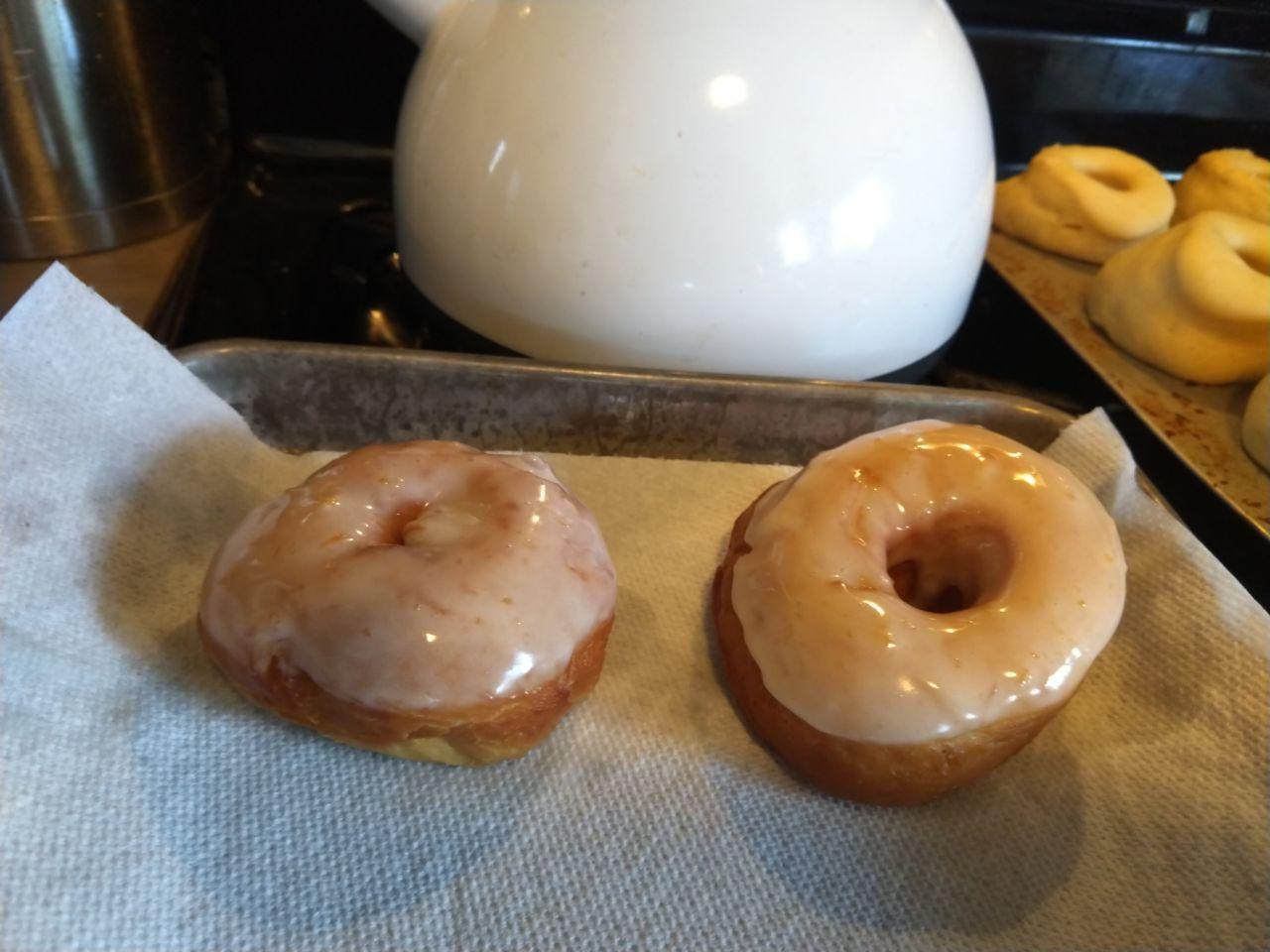 Two habanero glazed donuts.