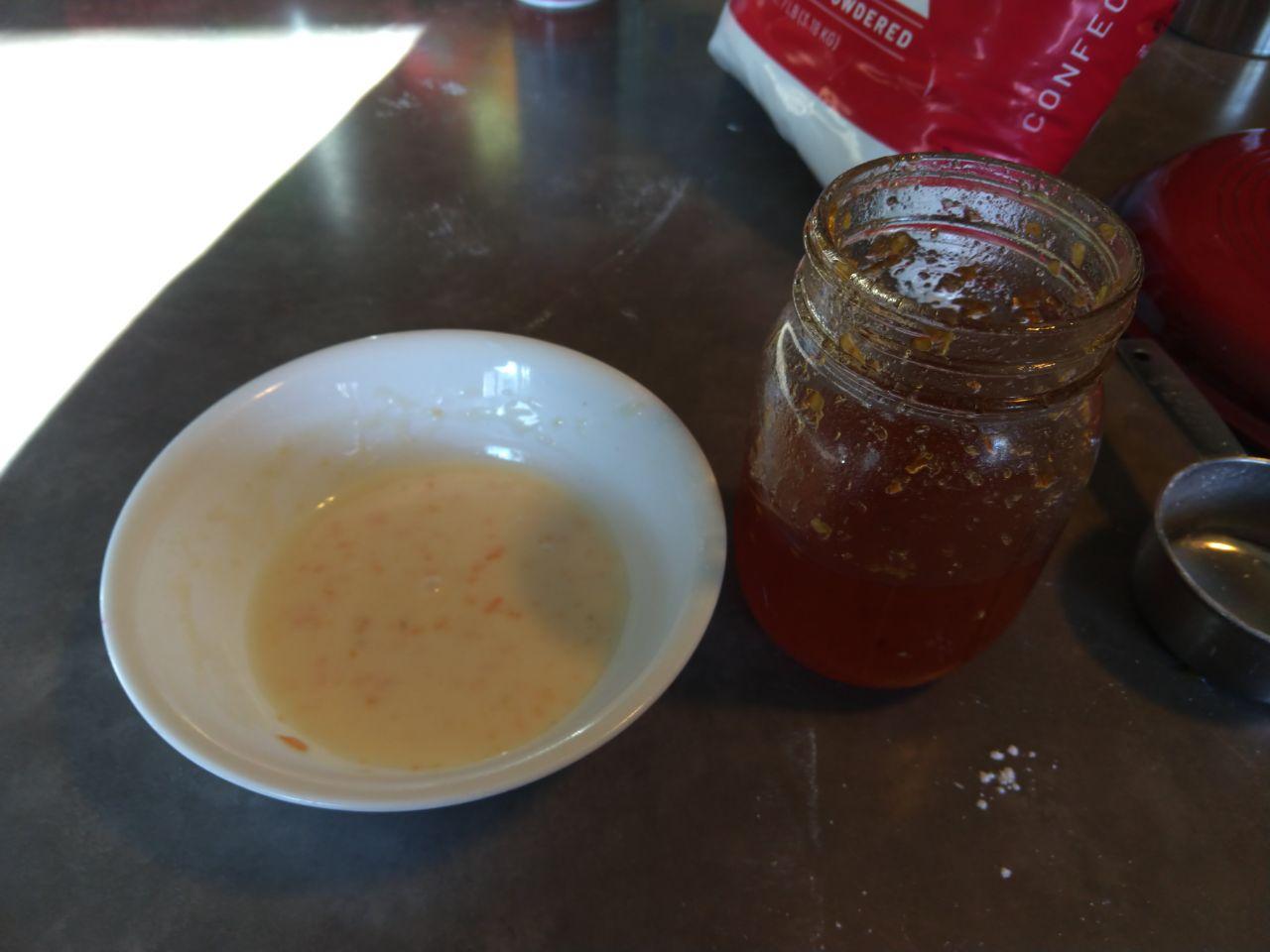 Habanero jam next to bowl of glaze.