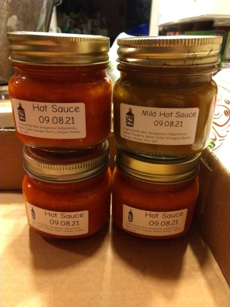 Jars of hot sauce.