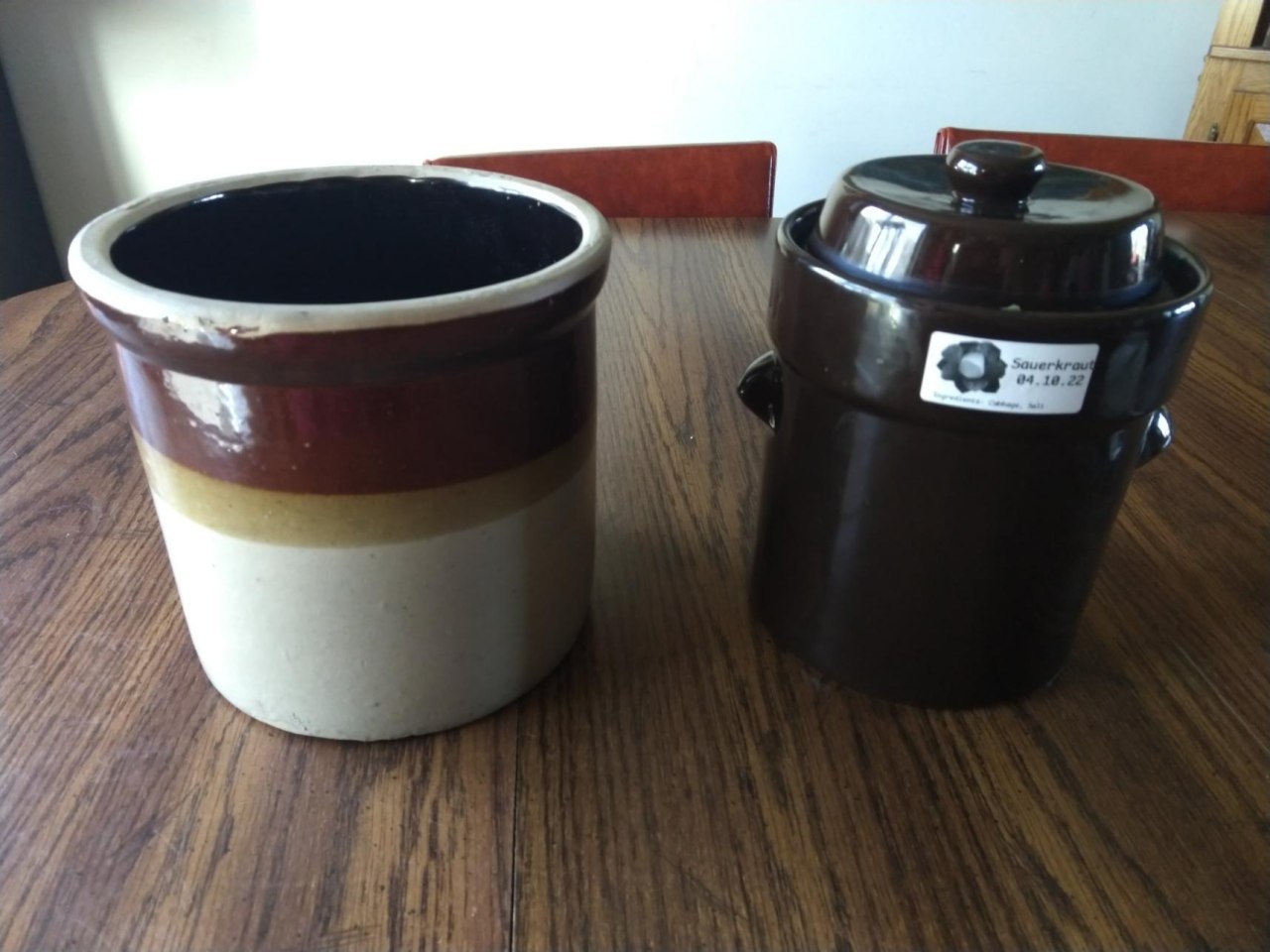 Two fermentation crocks. I got the one on the right at a thrift store. The one on the left is from my grandma, who got it from her grandma.