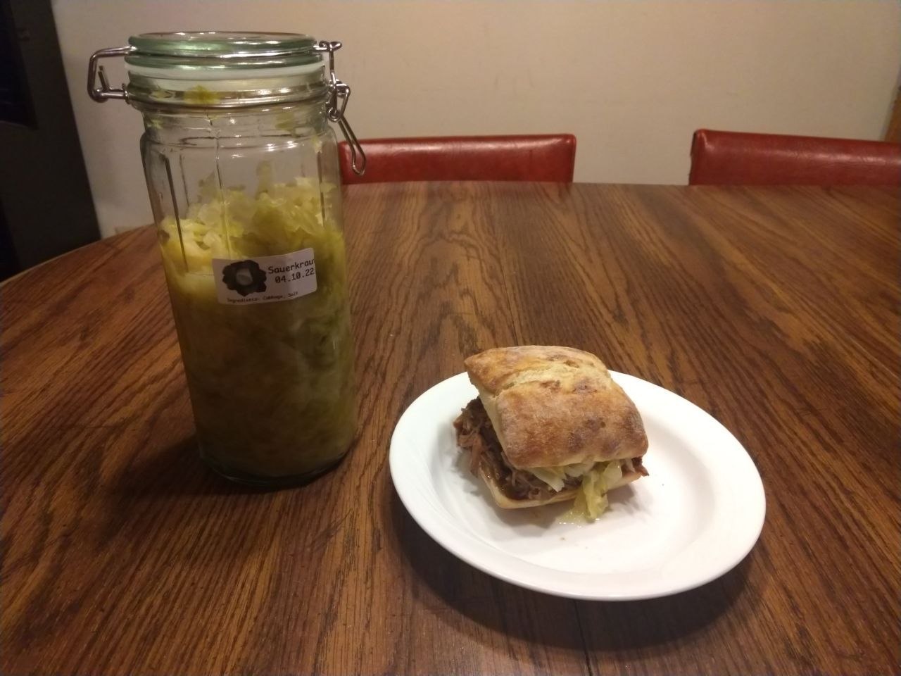 A sandwich with Italian beef and sauerkraut.