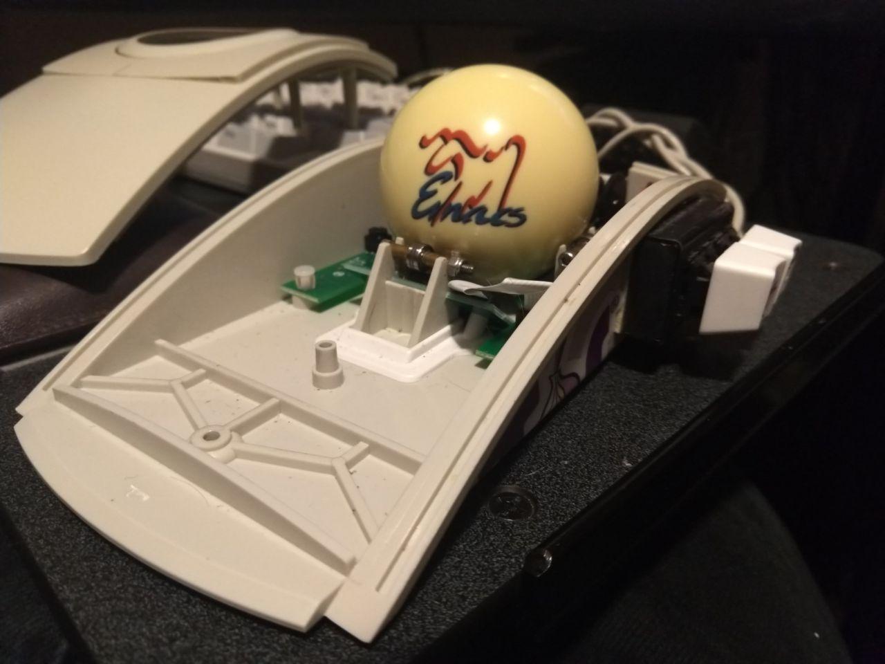 Beige CST trackball with low profile ball bearings installed.